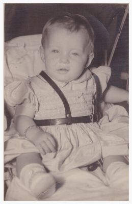 1947 - Taken on the same day as her formal portrait. She is wearing the same dress and bracelet.
