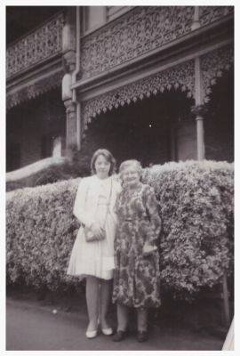 1959 Lois and her grandmother Maud in front of Maud's house in Nicholson St, Carlton
