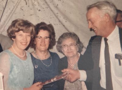 1967-03-22 Lois gets handed the traditional 21st birthday key by her dad, while her Win and Maud look on
