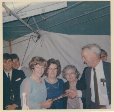 1967-03-22 Lois gets handed the traditional 21st birthday key by her dad, while her Win and Maud look on
