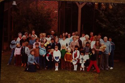 1980 A St Linus Mugshot
Our son David can be seen, just to the left of the girl with the white top and blue skirt in the front middle. David looks 3-4 years old so this must have been around 1984. So many young families and so many friends remembered.
