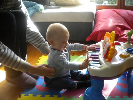 olly plays the piano